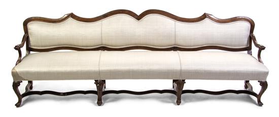 Appraisal: Sale Lot A Continental Walnut Settee having a shaped crest