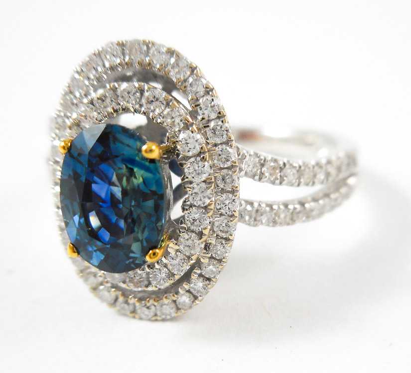 Appraisal: SAPPHIRE DIAMOND AND FOURTEEN KARAT GOLD RING The white and