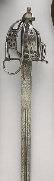 Appraisal: An early Victorian Scottish baskethilted officer's broadsword for the Scots