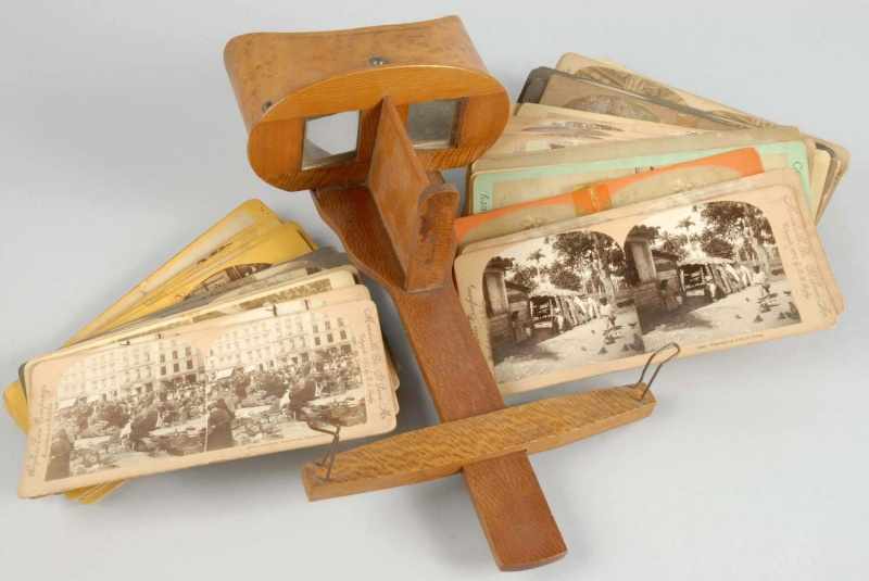 Appraisal: Wooden Stereoscope with over Cards Description Complete Condition Excellent Size