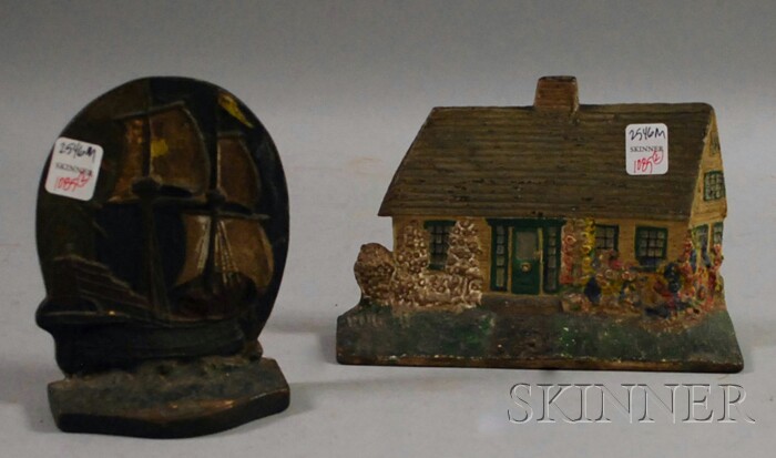 Appraisal: Painted Cast Iron Cape Cottage Doorstop and a Sailing Ship