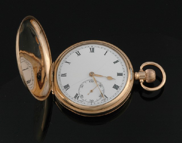 Appraisal: A GENTS GOLD POCKETWATCH Circa Having a round white enamel