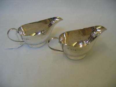 Appraisal: A MATCHED SET OF SAUCE BOATS of plain oval form