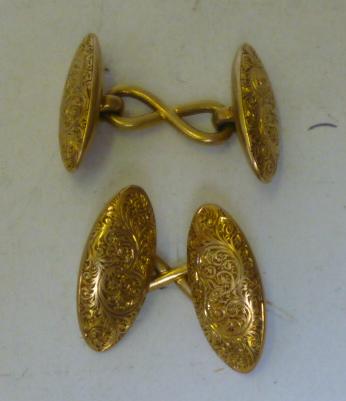 Appraisal: A PAIR OF CT GOLD CUFFLINKS the hollow navette panels