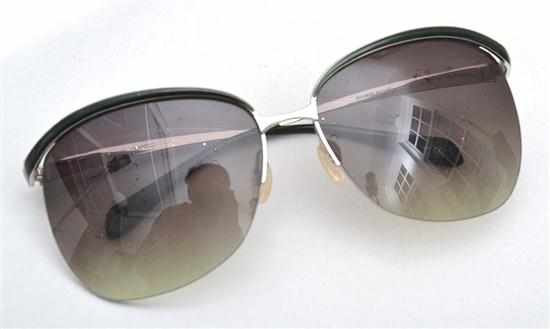 Appraisal: A PAIR OF SUNGLASSES BY OLIVER PEOPLES FOR BALMAIN