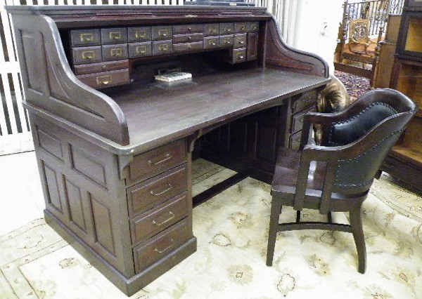 Appraisal: LARGE MAHOGANY ROLL-TOP DESK WITH CHAIR American c The double