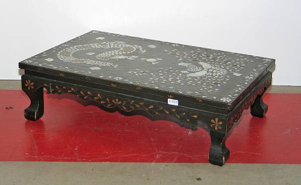 Appraisal: A Korean wood table with inlaid decoration The top decorated