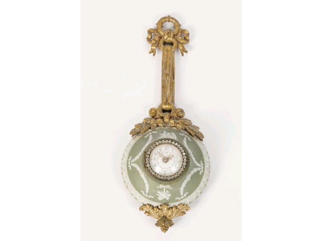 Appraisal: A JASPERWARE AND ORMOLU WALL CLOCK the green ground circular