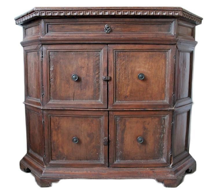 Appraisal: An Italian Baroque Walnut Credenza The rectangular top with canted