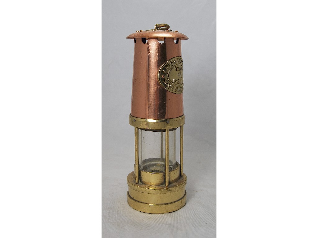 Appraisal: A brass and copper miner's lamp by Thomas Williams