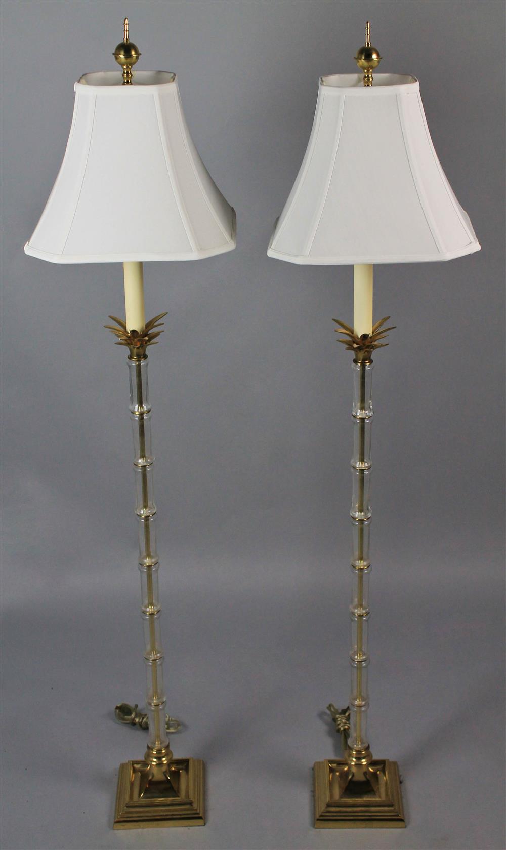 Appraisal: PAIR OF LUCITE FLOOR LAMPS WITH FROND DESIGN lucite poles