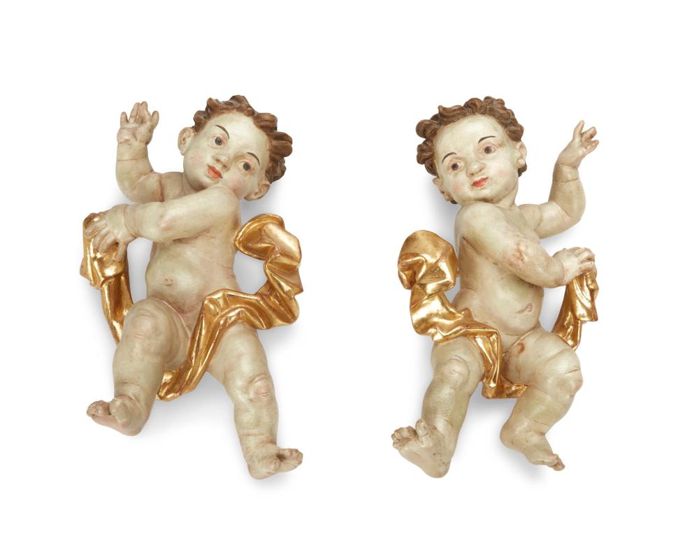 Appraisal: A pair of Southern German carved wood putti First-Quarter th