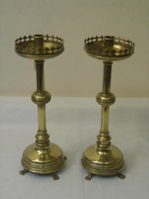 Appraisal: A PAIR OF VICTORIAN BRASS CANDLESTICKS the turned sconce with