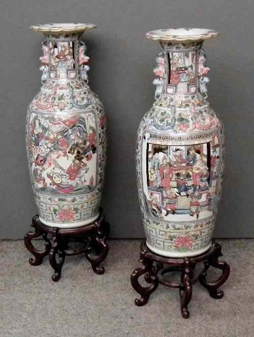 Appraisal: A pair of Chinese ''Cantonese'' porcelain ''Famille Rose'' vases moulded