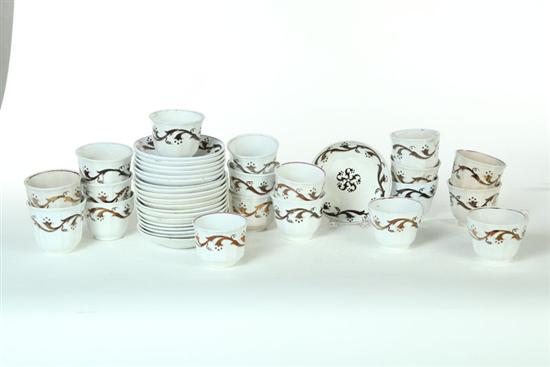 Appraisal: GROUP OF IRONSTONE COFFEE BERRY PATTERN Nineteen cups and saucers