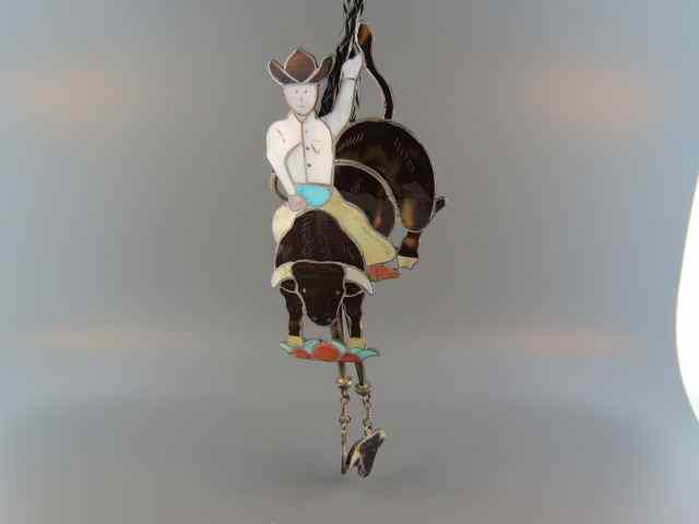 Appraisal: Indian Figural Bolo Tie rodeo rider on bull inlaid tortoise