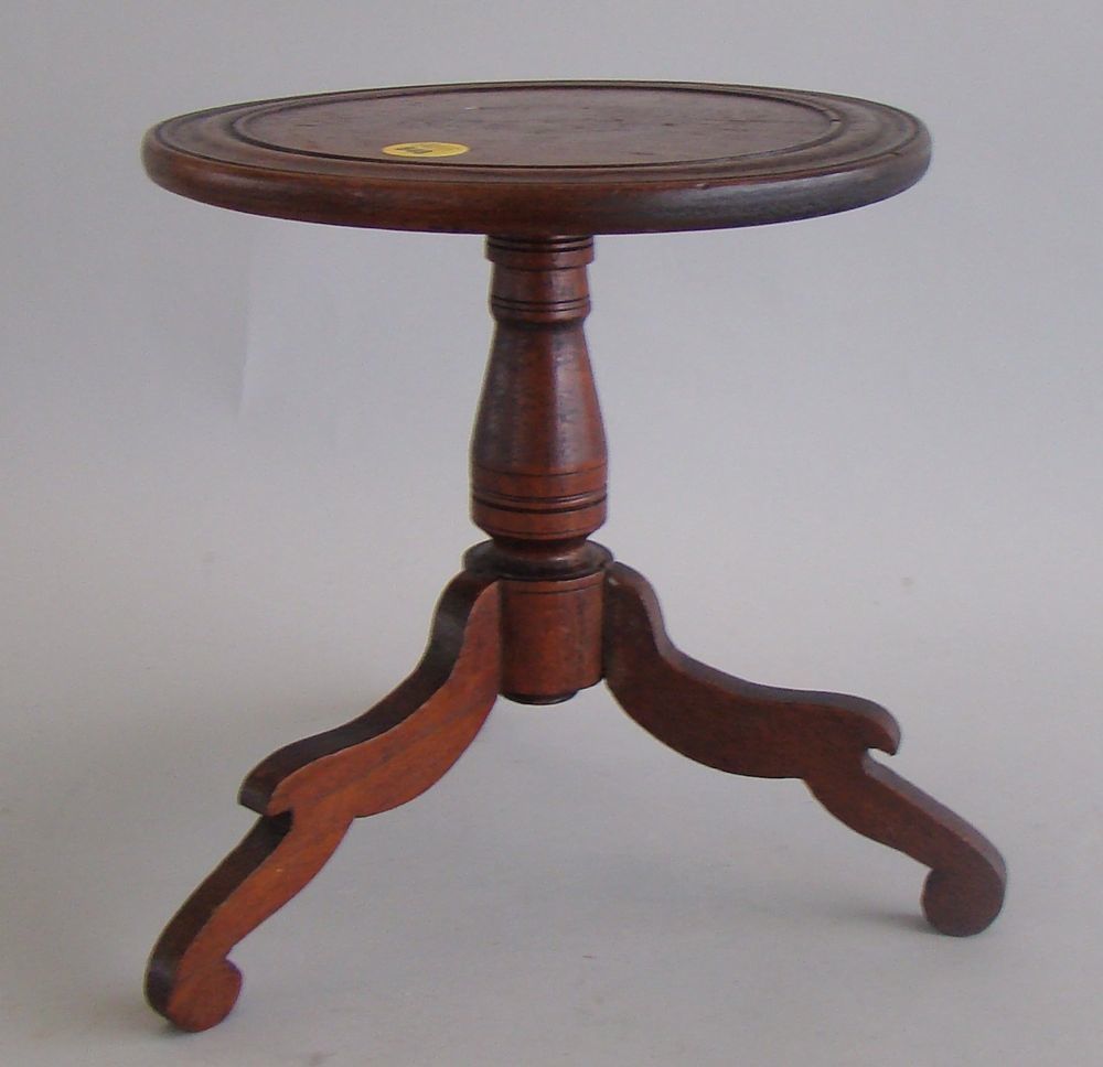 Appraisal: MINIATURE TEA TABLE Mid- th CenturyIn walnut with dish top