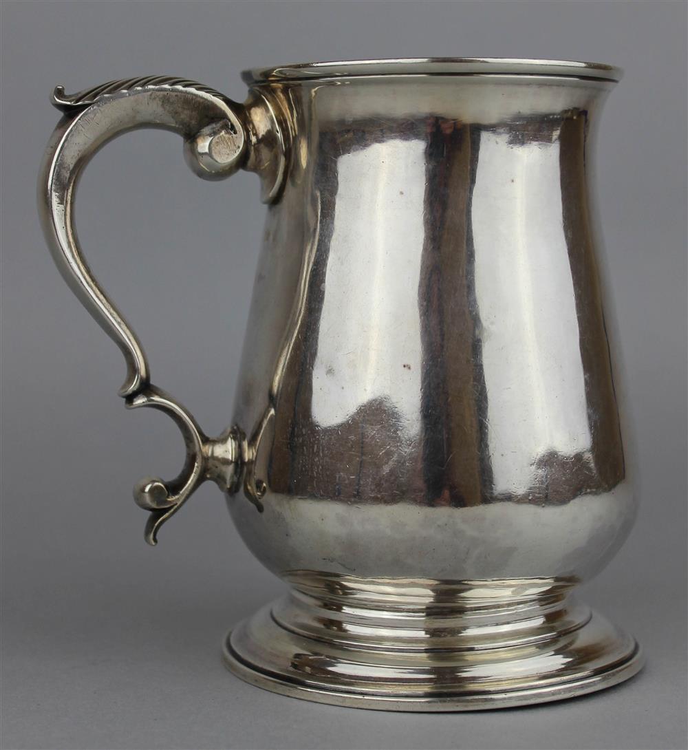 Appraisal: GEORGE III SILVER MUG maker's mark TK pear shaped the