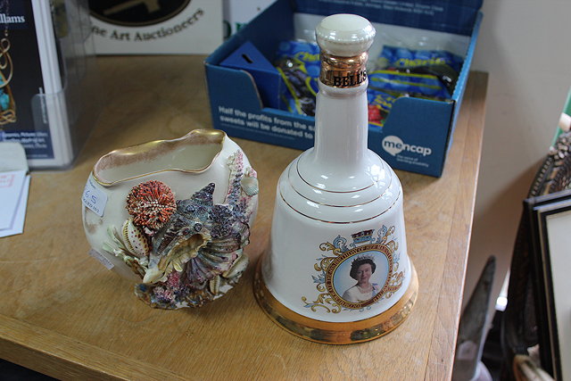 Appraisal: AN UNOPENED COMMEMORATIVE PORCELAIN DECANTER of Bells Scotch Whisky from