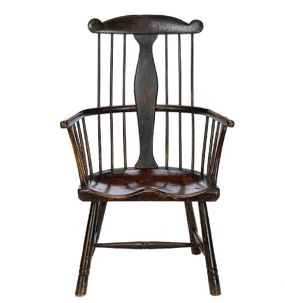 Appraisal: A Windsor comb back armchair height in width in depth