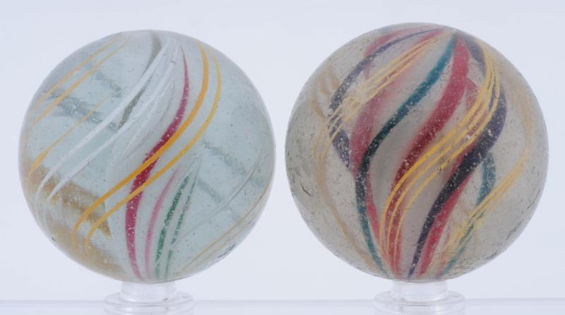 Appraisal: Lot Of Large Solid Core Swirl Marbles The first is