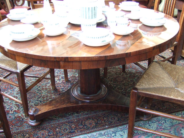 Appraisal: An early th century circular rosewood breakfast table the tilt