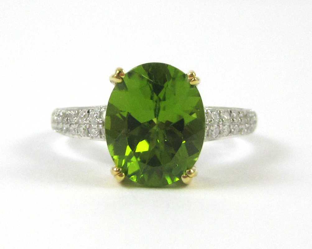 Appraisal: PERIDOT AND DIAMOND KARAT WHITE AND YELLOW GOLD RING the