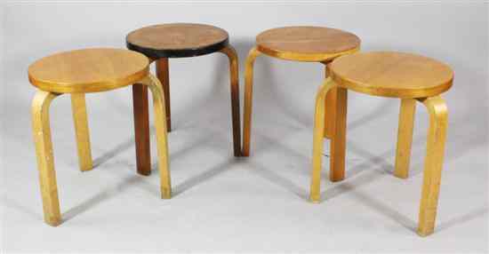 Appraisal: A nest of four Finmar birchwood stools designed by Alvar