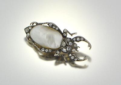 Appraisal: A Blister Pearl Diamond Gold and Silver Bug Brooch Naturalistically