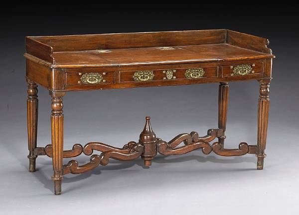 Appraisal: An Anglo Indian brass mounted hardwood writing desk in the