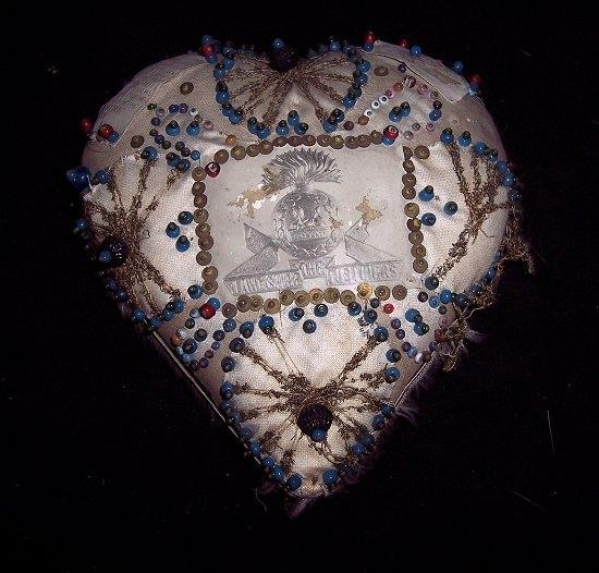 Appraisal: A th Century heart shaped cushion with pinwork decoration and