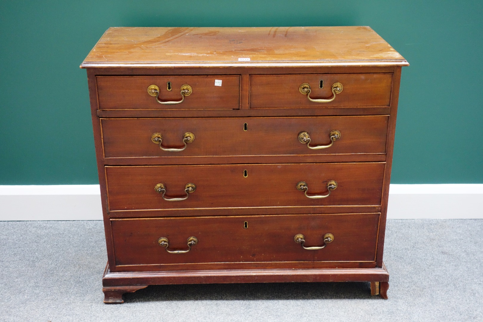 Appraisal: A mid th century mahogany chest of two short and