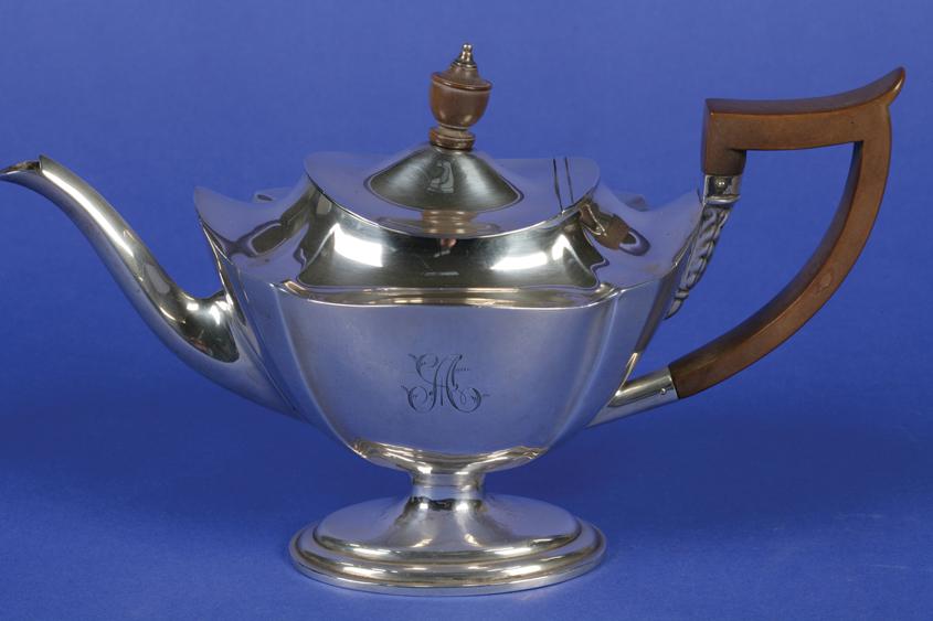 Appraisal: A GEORGE V TEAPOT of tapering oval form with a