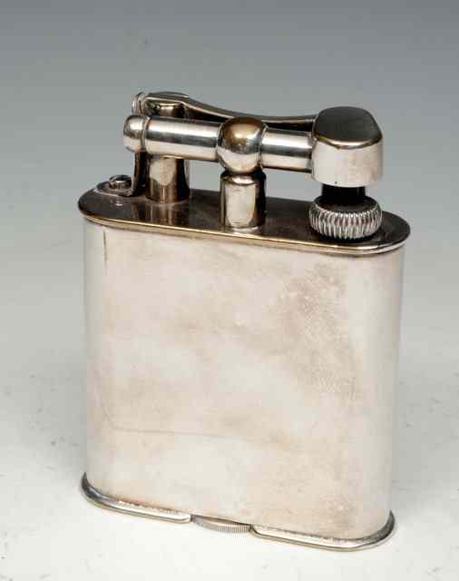 Appraisal: A SILVER PLATED DUNHILL TABLE LIGHTER high