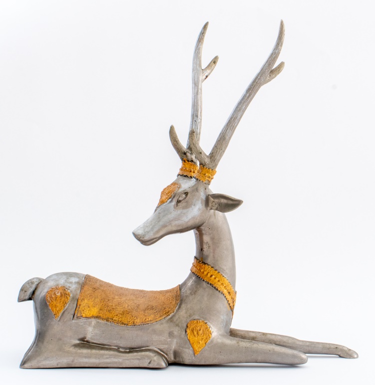 Appraisal: INDIAN TWO-TONE METAL SCULPTURE OF GAZELLE Modern silvered sculpture of