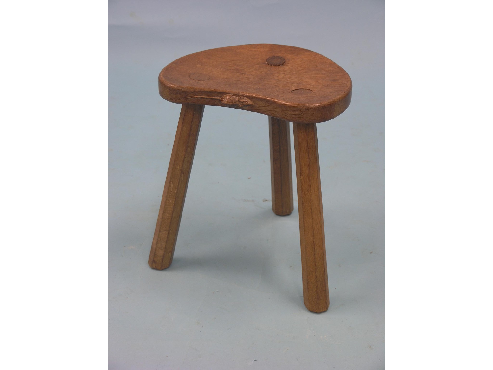 Appraisal: Robert Mouseman Thompson of Kilburn - three-legged stool with kidney-shape