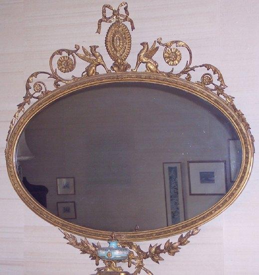 Appraisal: A Victorian oval mirror of Adam design the top with