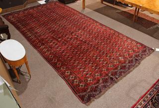 Appraisal: Afghan Turkomen carpet ' x ' Provenance Estate of Dr