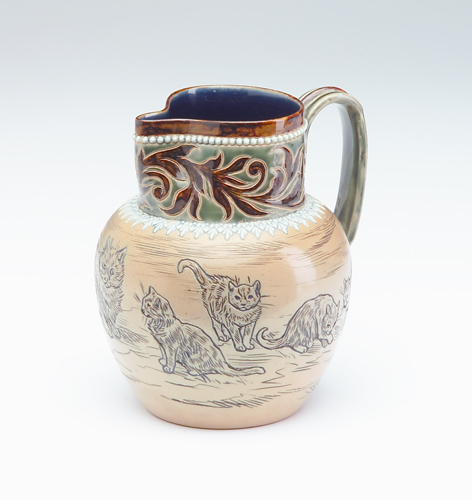 Appraisal: DOULTON LAMBETH Stoneware pitcher decorated in sgraffito by Hannah Barlow