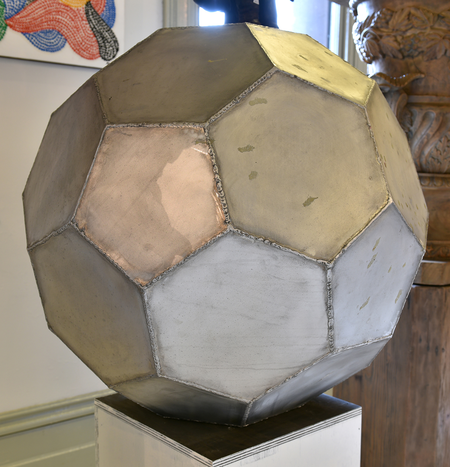 Appraisal: A JUSTIN ZAHRA GEOMETRIC MULTI-FACED BRUSHED ALUMINIUM SCULPTURE cm diameter