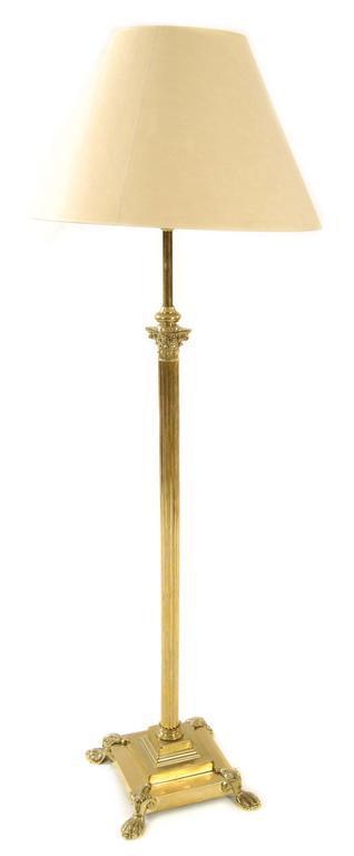 Appraisal: A brass Corinthian column adjustable standard lamp