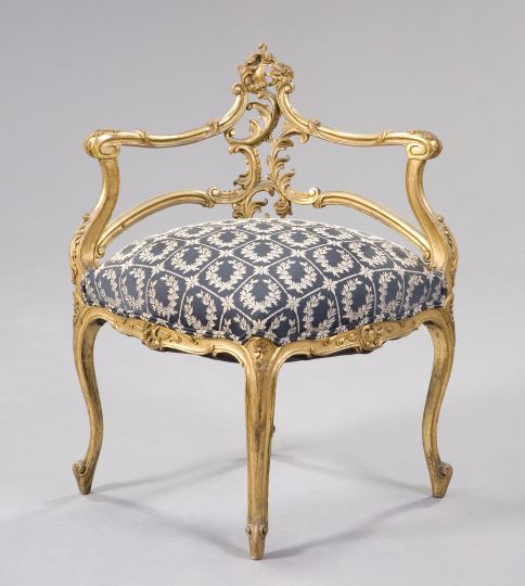 Appraisal: Louis XV-Style Giltwood Corner Chair early th century the foliate-carved