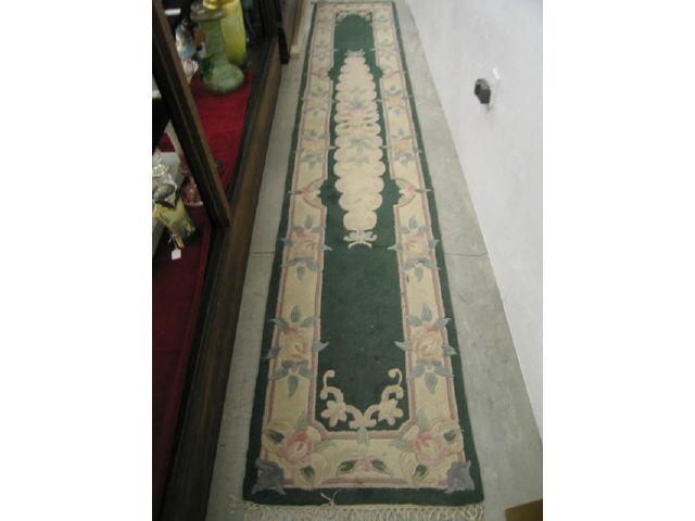 Appraisal: Chinese Handmade Runner green with floral trim ivory border '