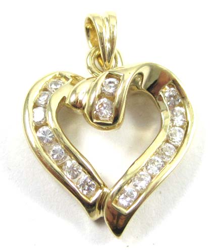 Appraisal: DIAMOND AND TEN KARAT GOLD PENDANT The yellow gold open