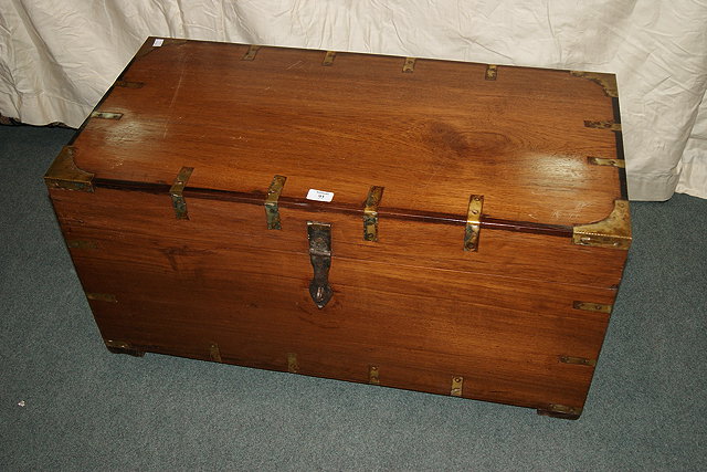 Appraisal: A TH CENTURY CAMPAIGN STYLE TRUNK with brass bindings and