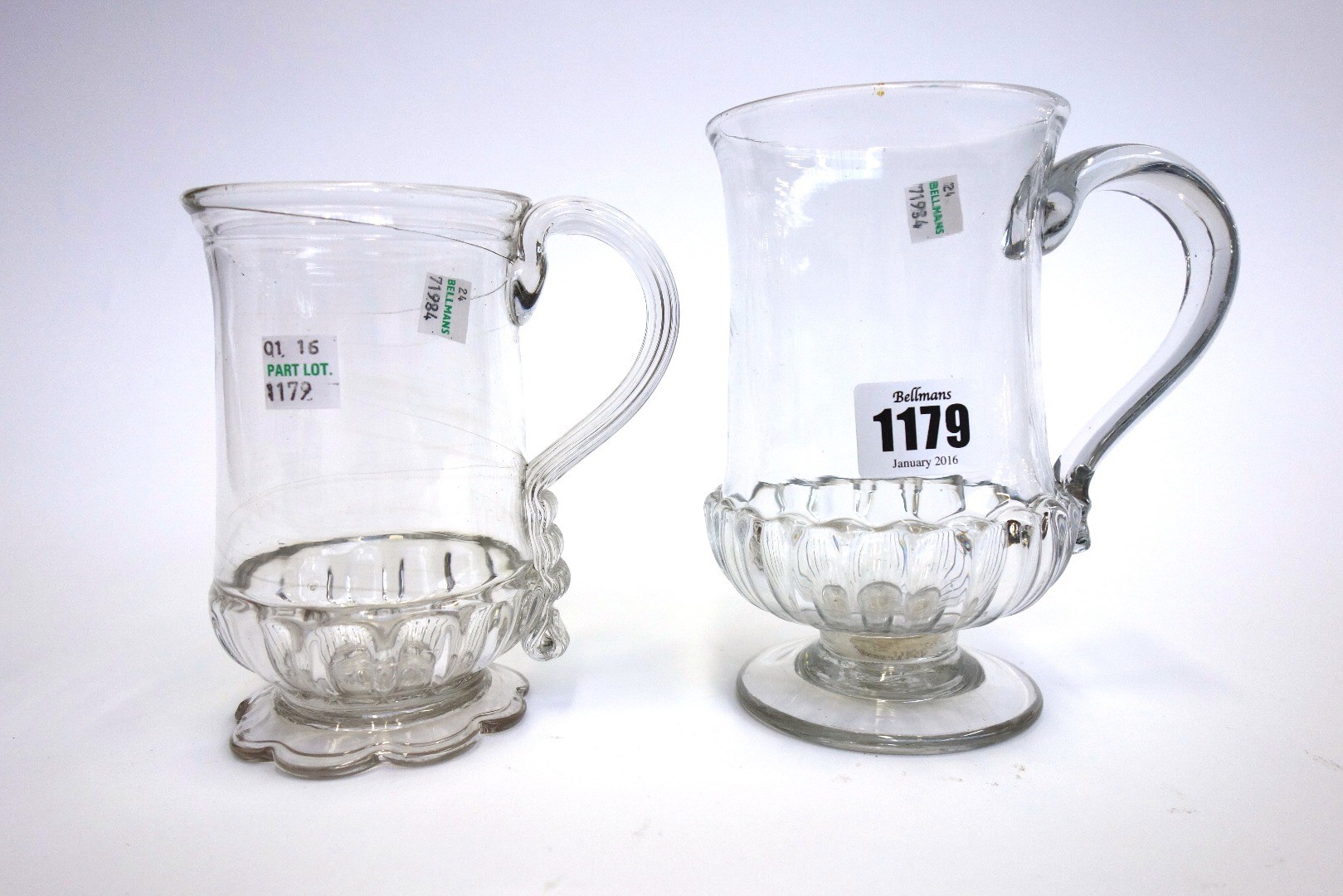 Appraisal: An English glass tankard late th century with triple reeded