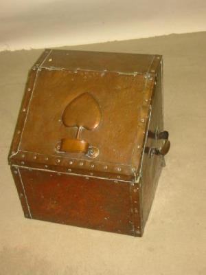 Appraisal: AN ARTS AND CRAFTS COAL BOX of oblong form with