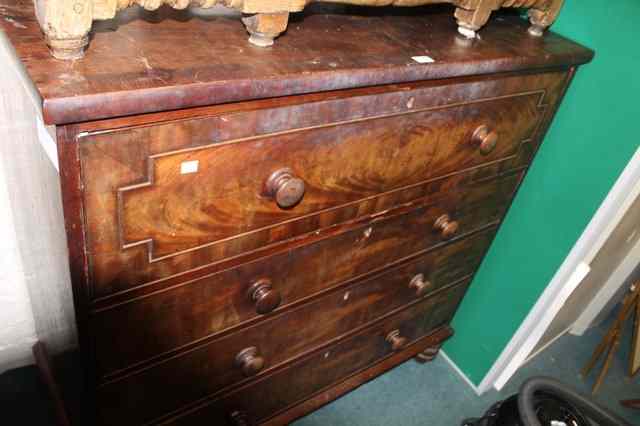 Appraisal: A TH CENTURY MAHOGANY CHEST of four long drawers with