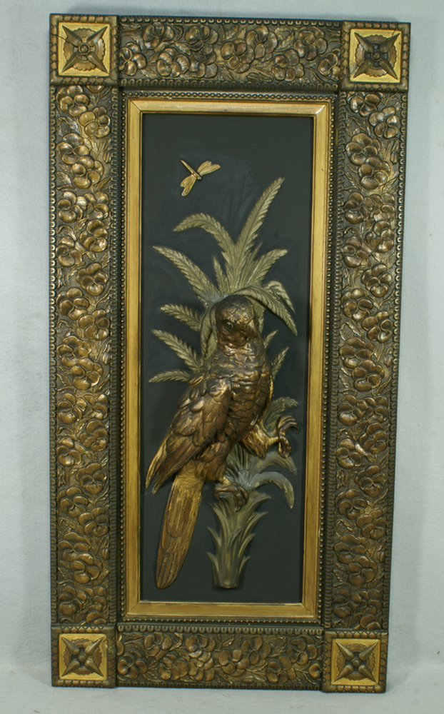 Appraisal: Composition hanging panel depicting a parrot on a plam tree