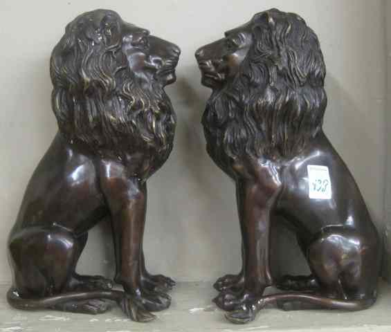 Appraisal: PAIR OF BRONZE LIONS cast in matching seated pose Height